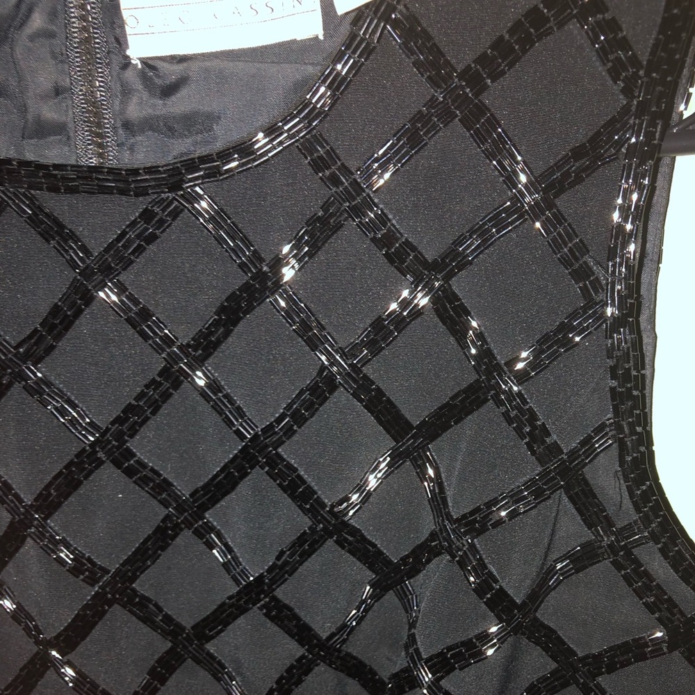 Sleeveless sequined top.